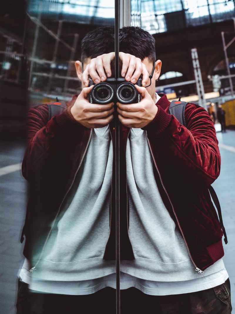 person using black camera